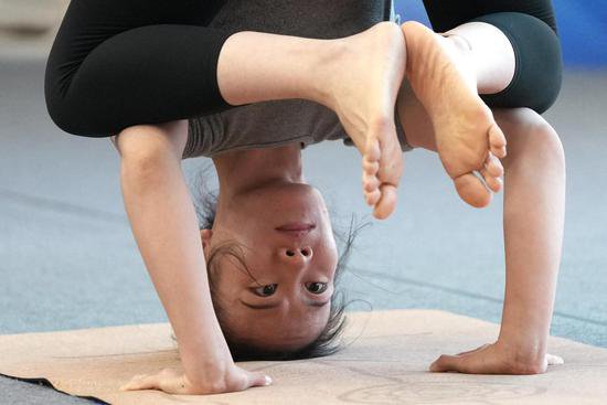 第三届北京健身瑜伽公开赛吸引300余<em>名</em>运动员参加
