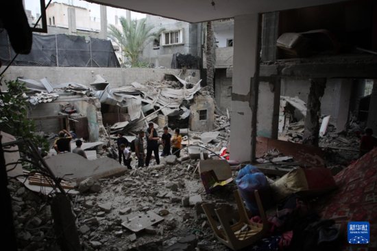 以军空袭加沙中部和南部造成至少14<em>人</em>死亡