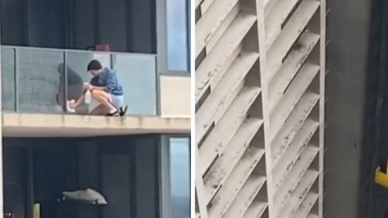 不要命了！国外一男子跪在30<em>楼阳台</em>外侧擦玻璃